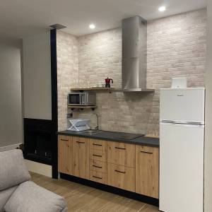 Cocina y chimenea casa rural 11