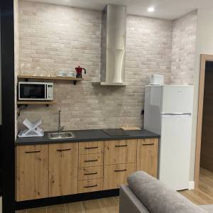 Cocina y chimenea casa rural 11